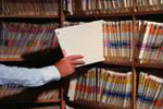 Photo of documents being filed